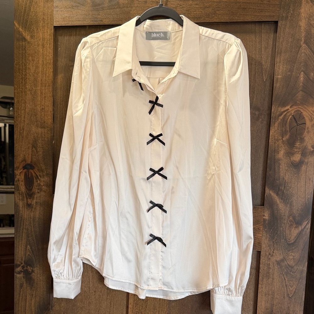 Blush Ivory Button-Front Blouse with Black Bow Accents